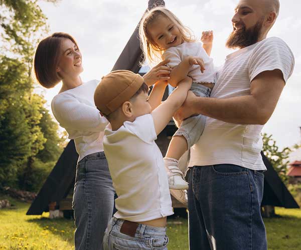 A family enjoying time together in their yard.
